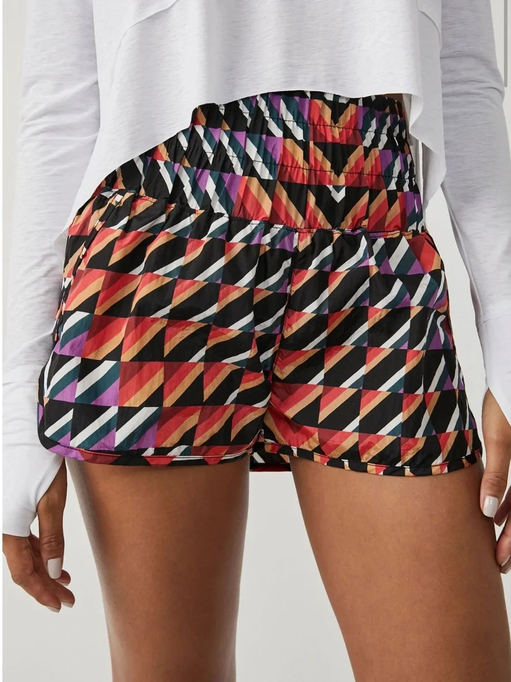 NWT Free people movement Orange crush combo print athletic shorts size Xs